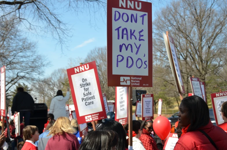 a group of people in protest outside in protest