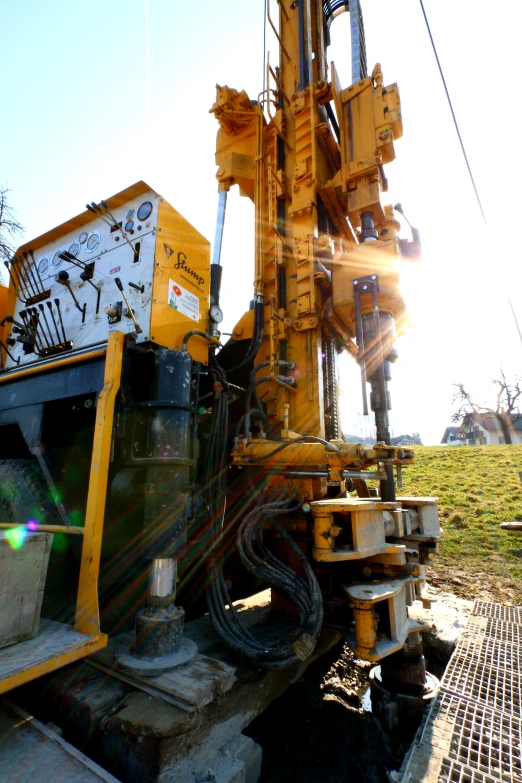 there are different types of drilling equipment parked outside