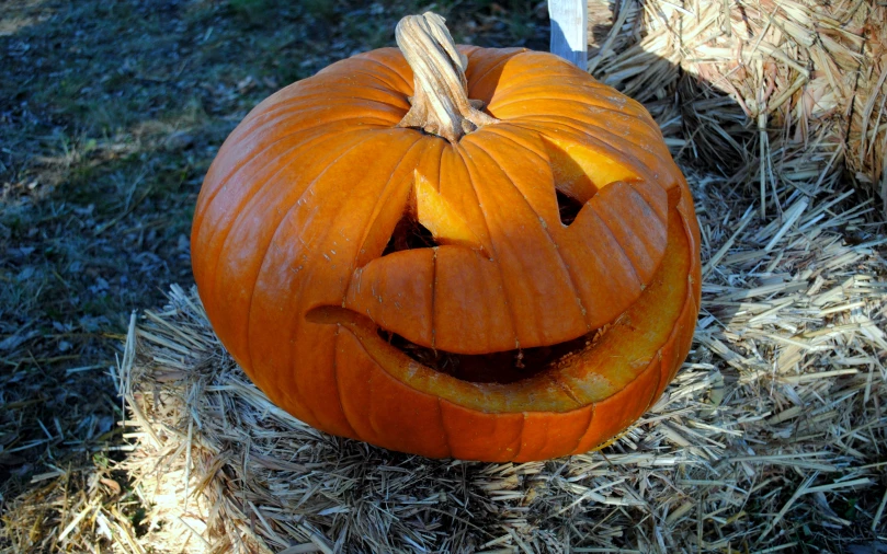 the carved pumpkin has been carved into a face