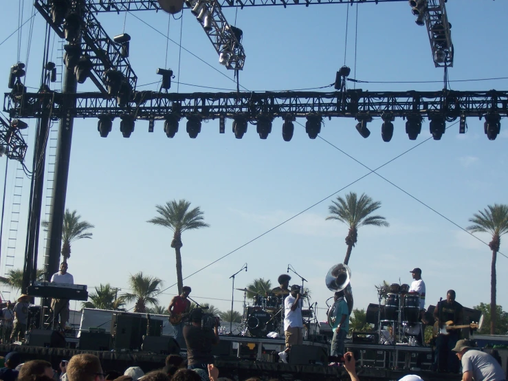 a group of people on stage playing instruments