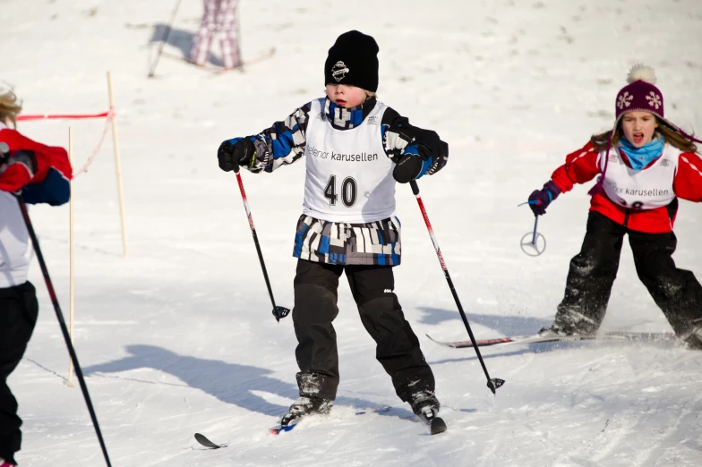 the cross country skiers are competing in this competitive race