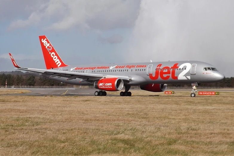 the large jet is parked on the runway