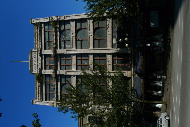 a building with cars parked in front of it