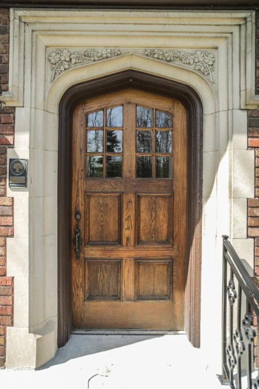 the front door of a building with decorative doorway