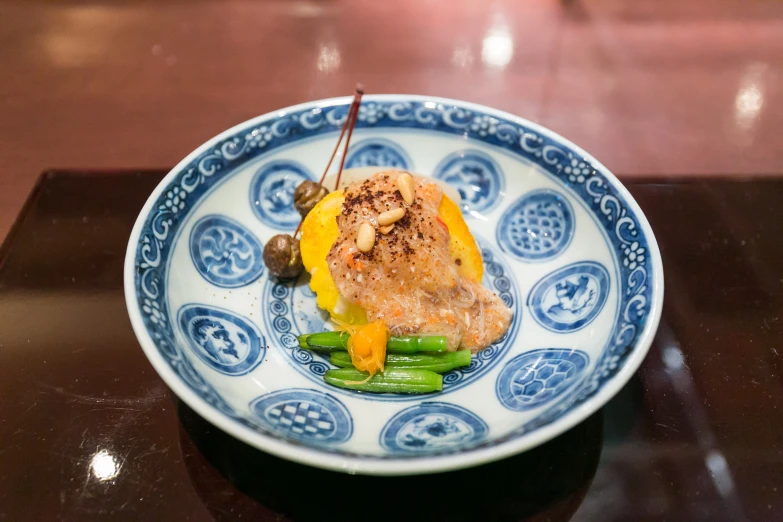 a dish is shown on the table for a meal