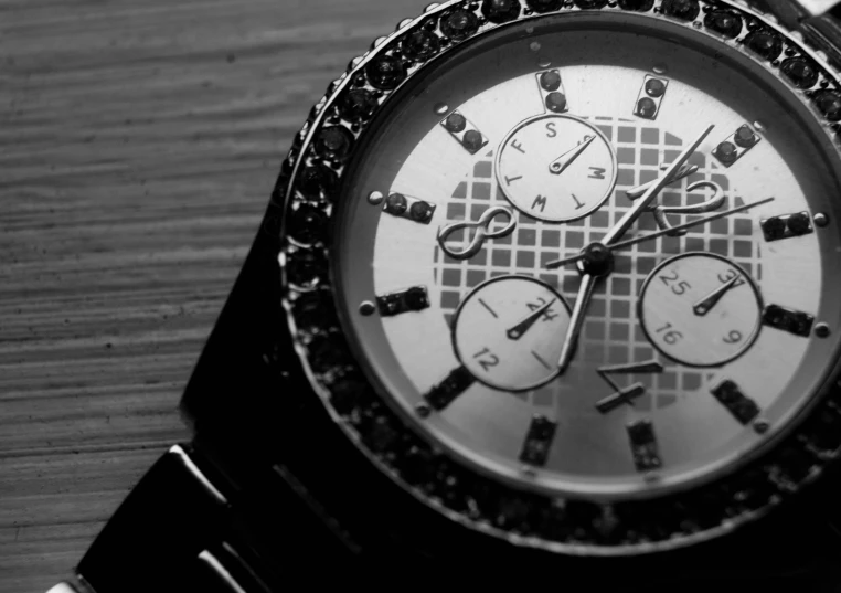 black and white po of a luxury watch