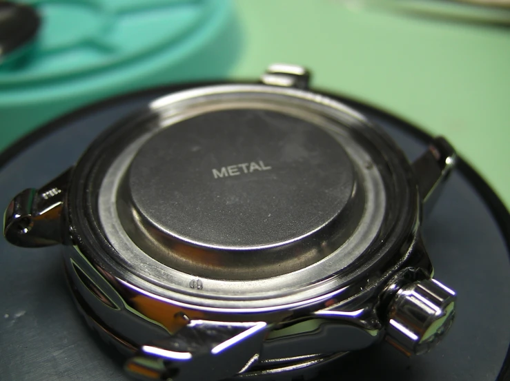 the top view of a metal watch face