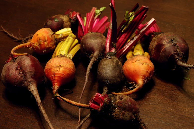 this is a pile of turnips with some radishes