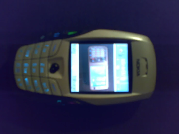 a flip phone with two screens displaying text messages