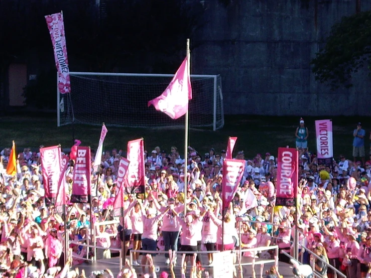 an event with people dressed in pink