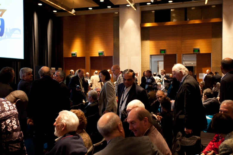 a group of people gathered together in a room