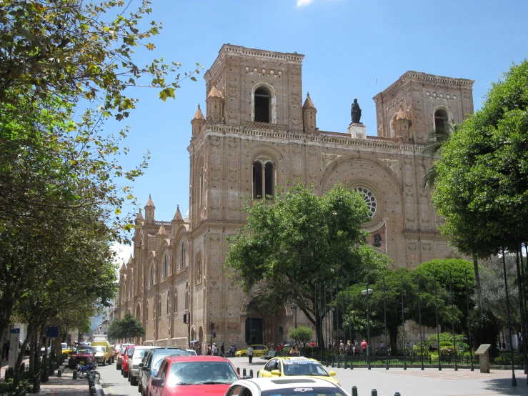 an old cathedral stands tall on a bright sunny day