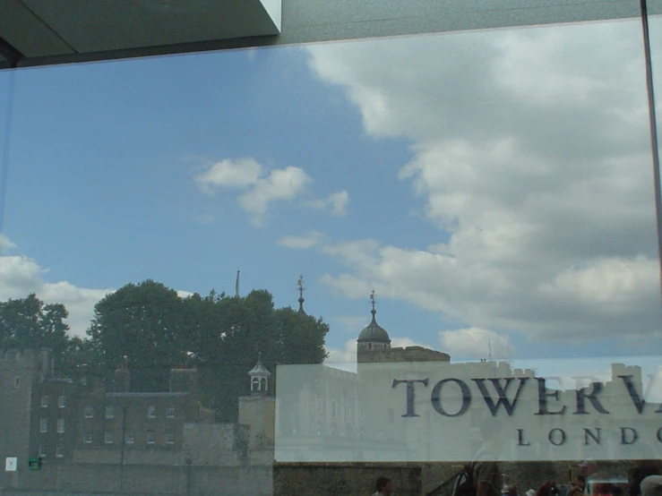 the view from a building through a window at a city