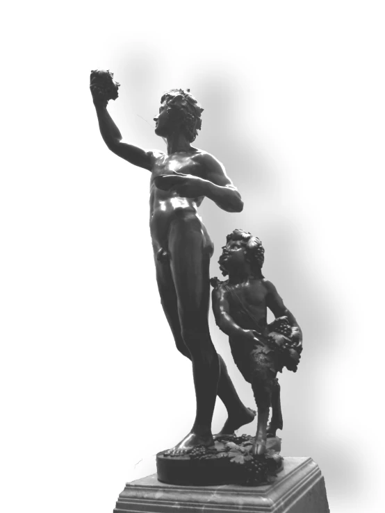 an antique bronze statue that is holding up a small statue