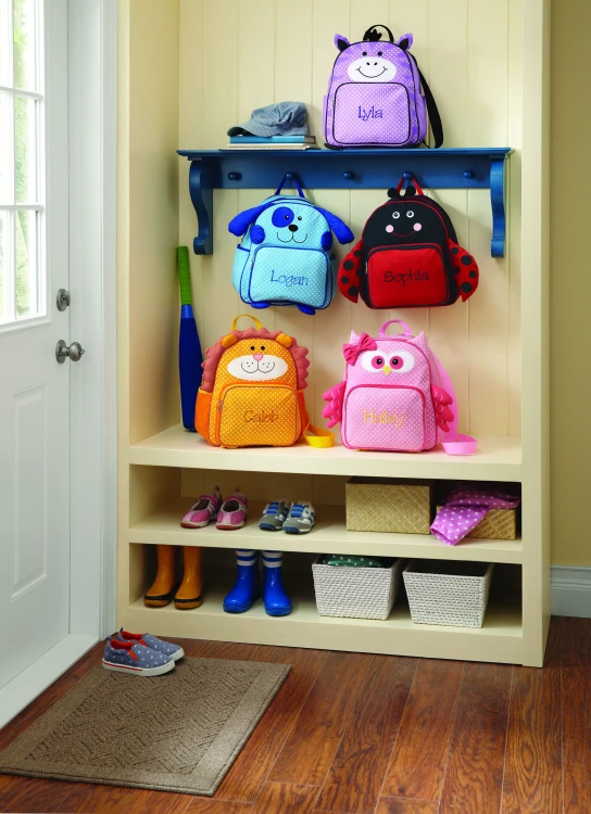 a display filled with different types of little  backpacks