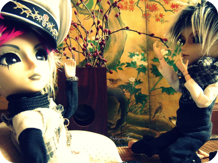 two dolls wearing pirate costumes near each other