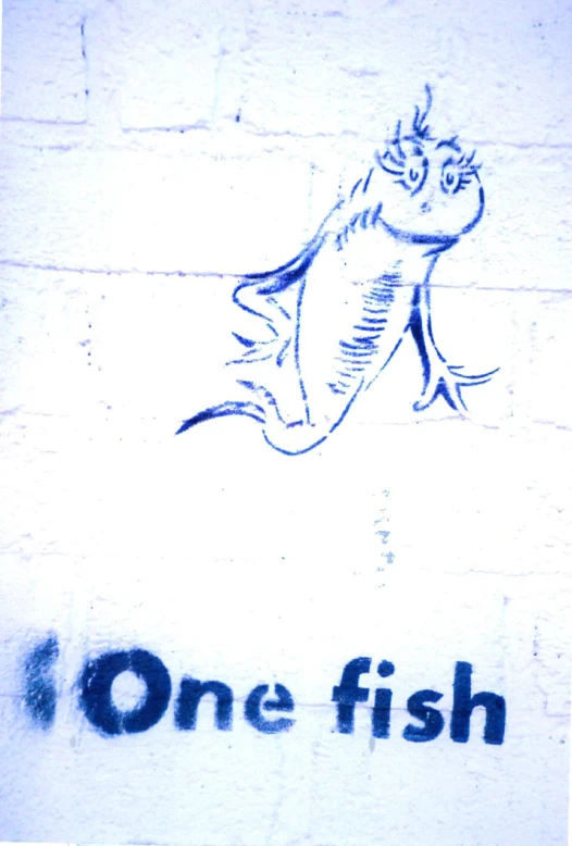 a sign with a fish drawn on it