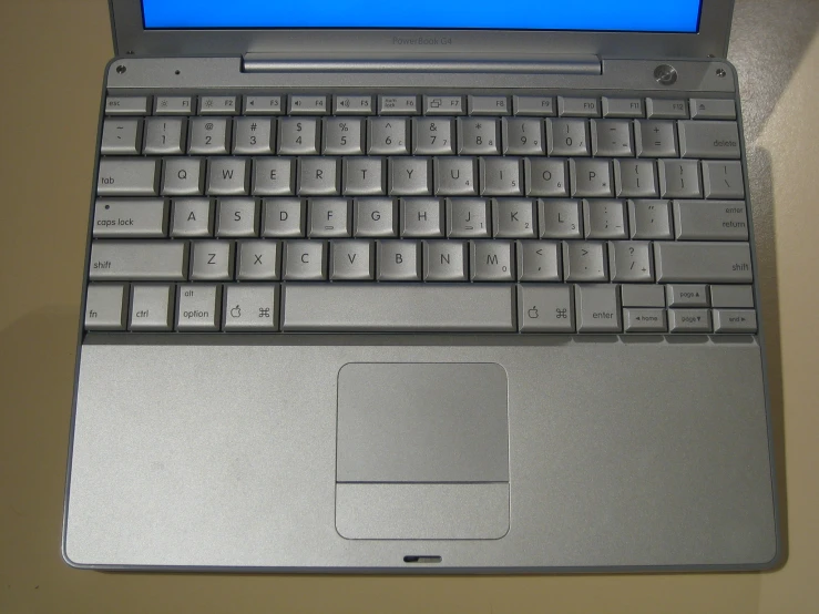 the side of a laptop, with the keyboard still attached