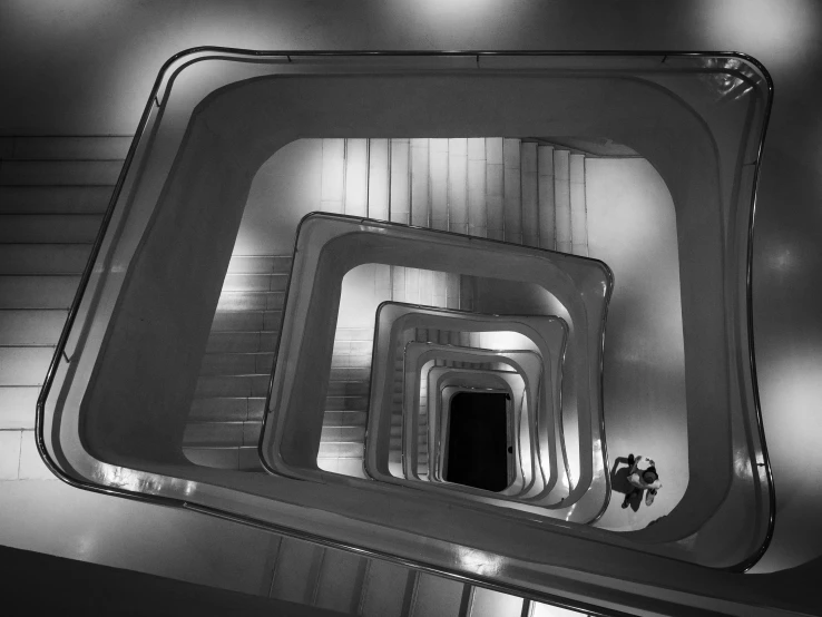 people walking inside a circular tunnel