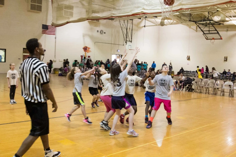 s on a basketball court playing a game