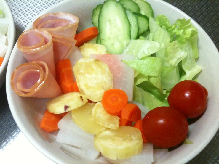 a close up of a plate of food containing vegetables