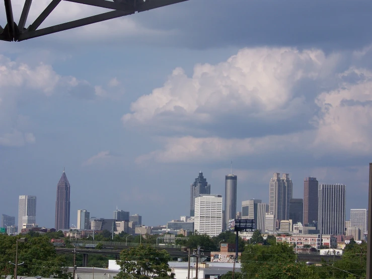 the city skyline has skyscrs in the background