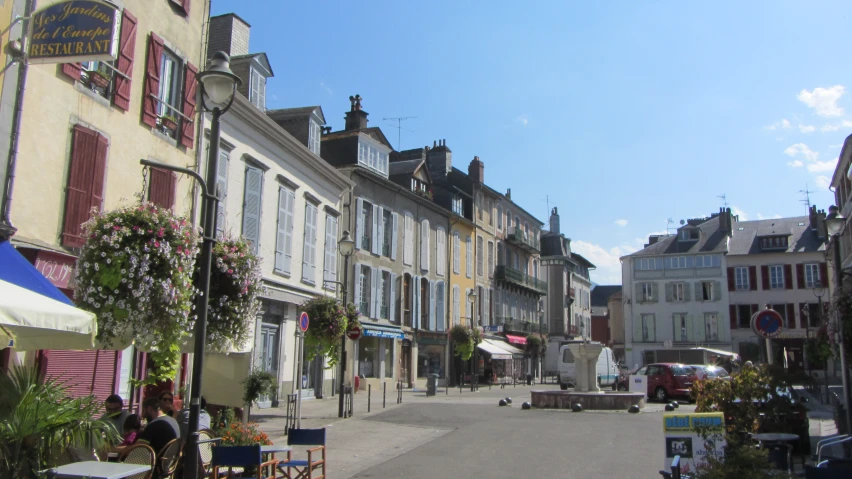 a european town square that looks old and narrow