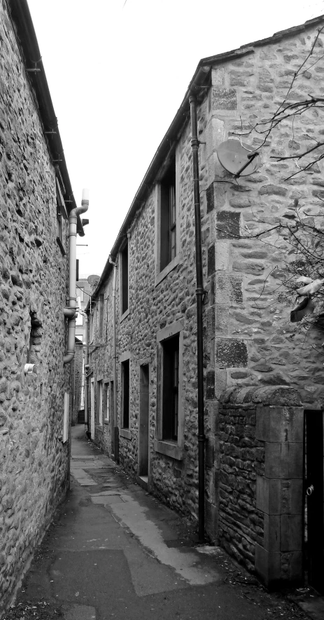 old stone buildings on either side of a street