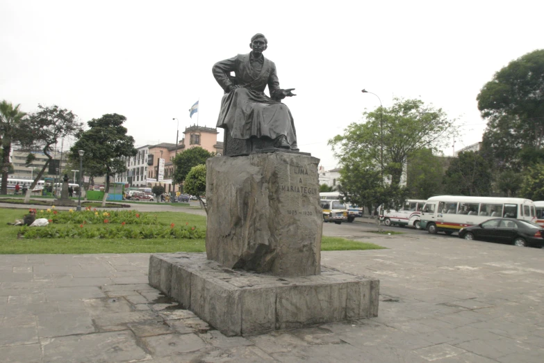 the statue is on a block in the street