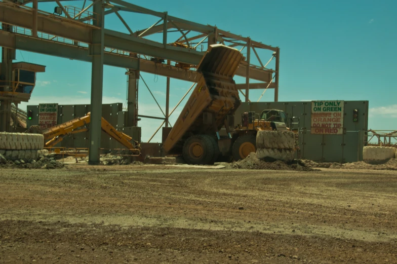 large construction equipment sitting out on the ground