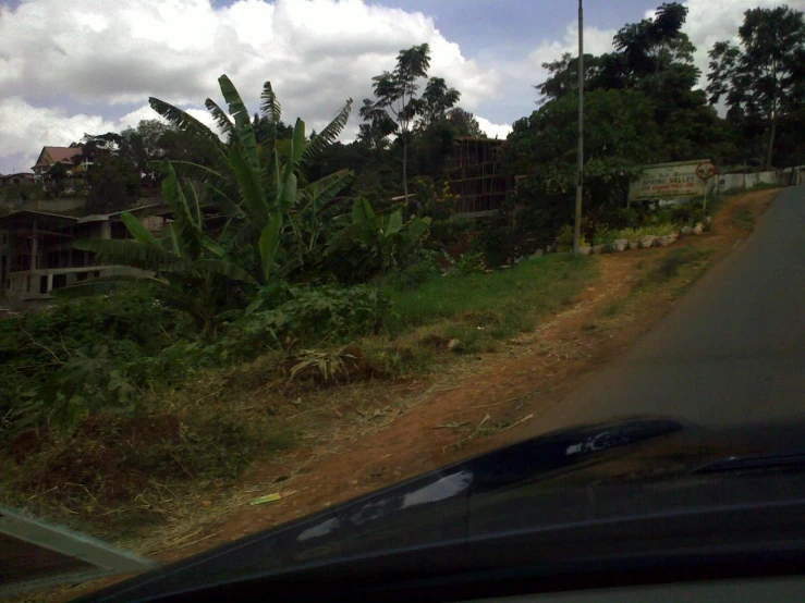 the view out the window of a vehicle on the road