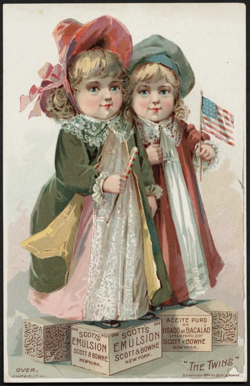 two little girls dressed in dresses with a flag