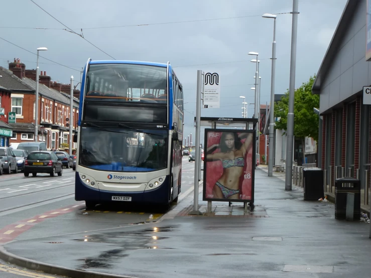 a double decker bus coming down the road