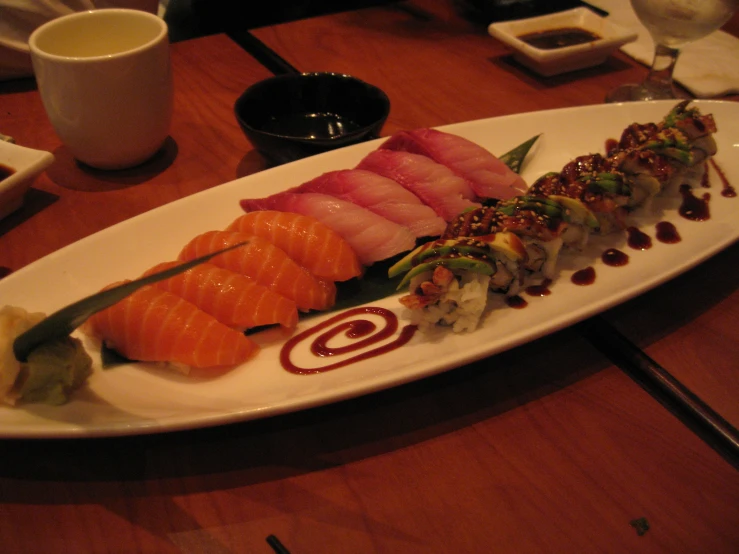 some kind of sushi on a large plate