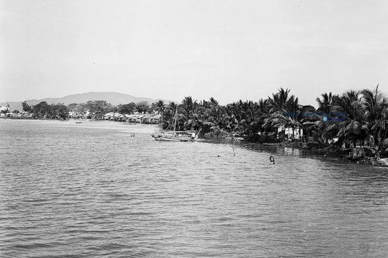 black and white pograph of town by the water