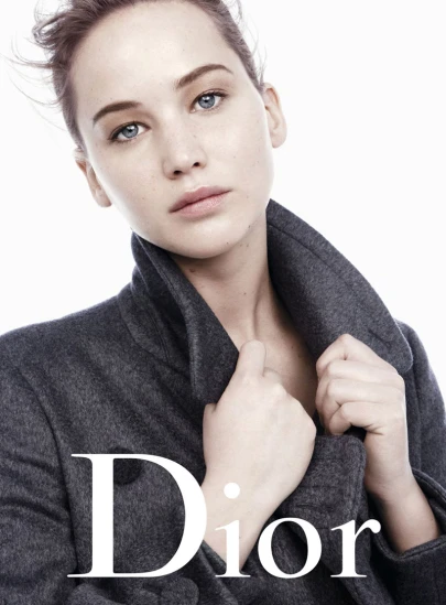 a woman is posing for the cover of dior