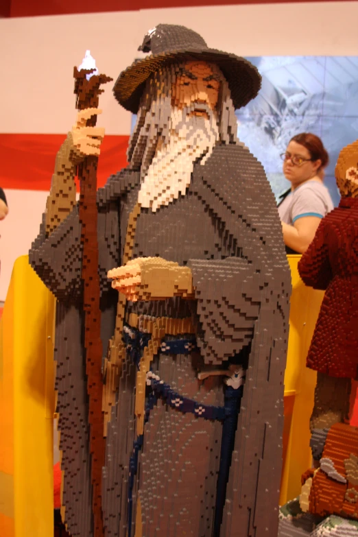 the man is dressed up like legos for a wizard show