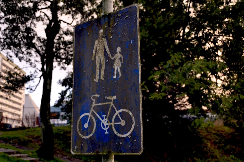 a street sign on the side of a road