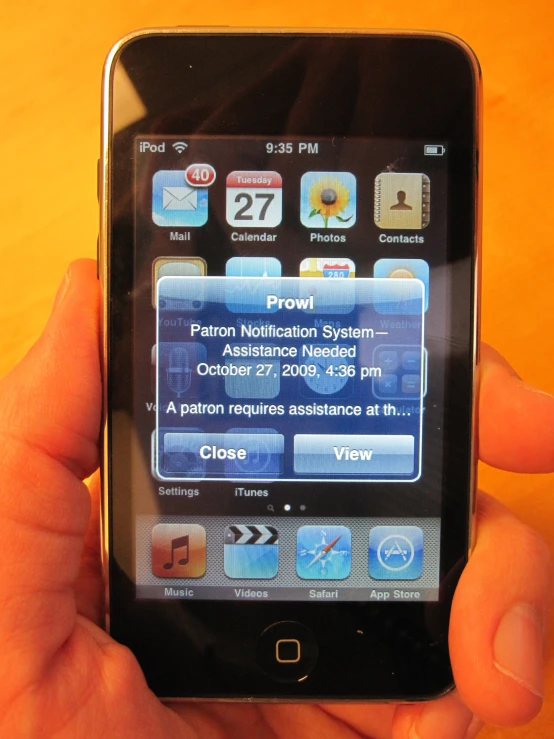 the phone is turned on and showing a screen with various icons