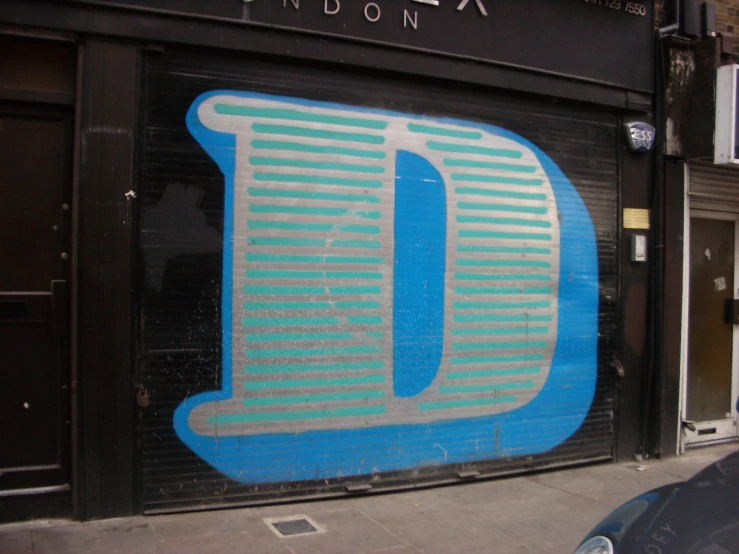 a large garage door with the letters d on it