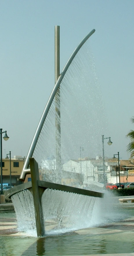 an abstract design of water spouts into the river