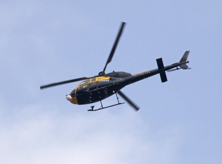 a helicopter flying in the air above itself