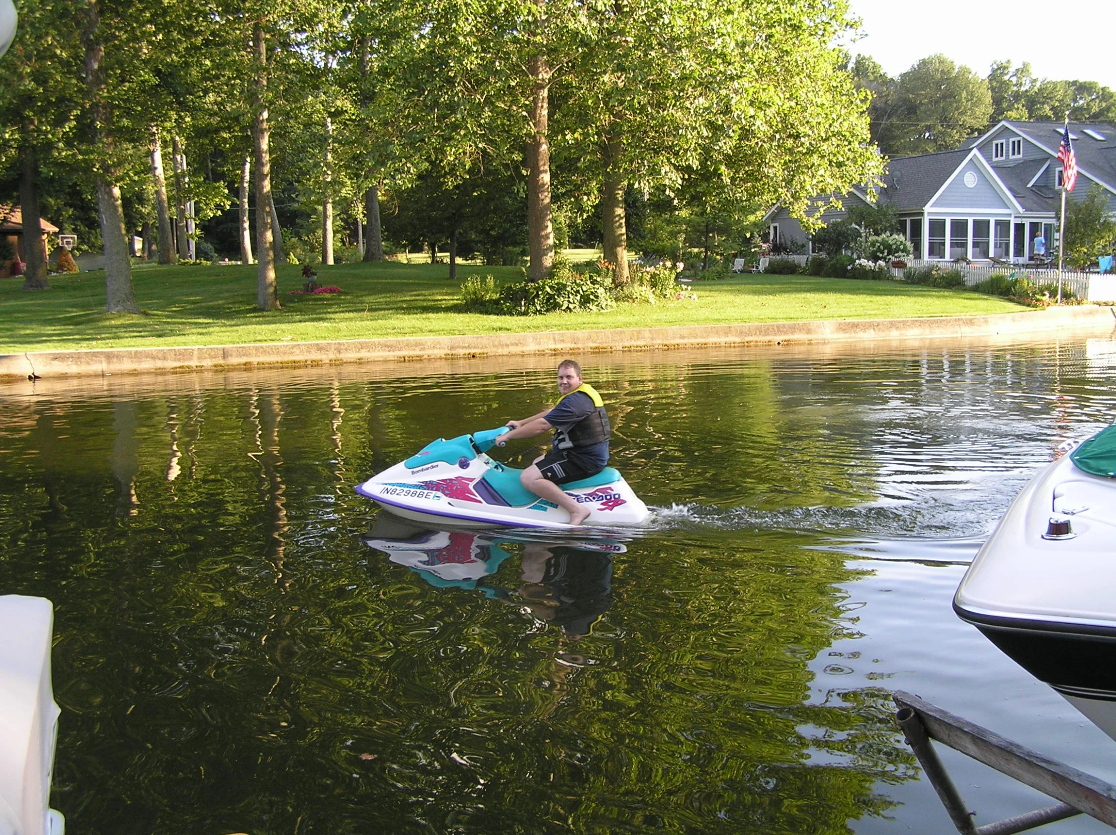 a man on a water ski in a lake