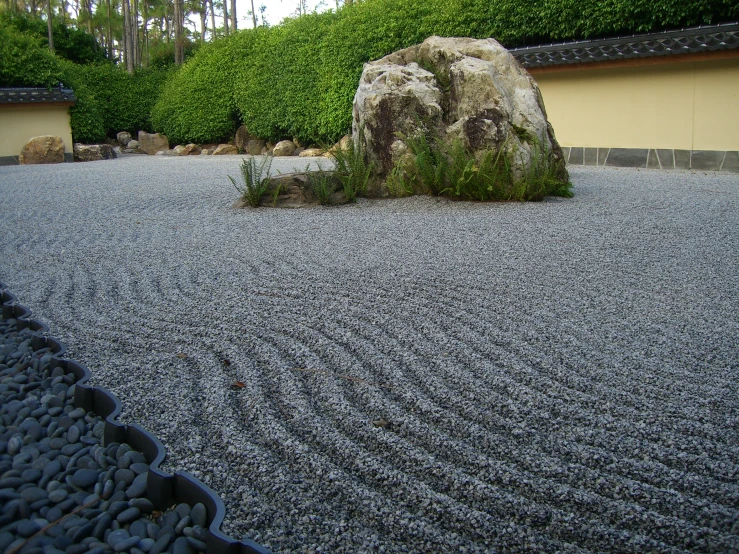 a rock that has been placed in the sand