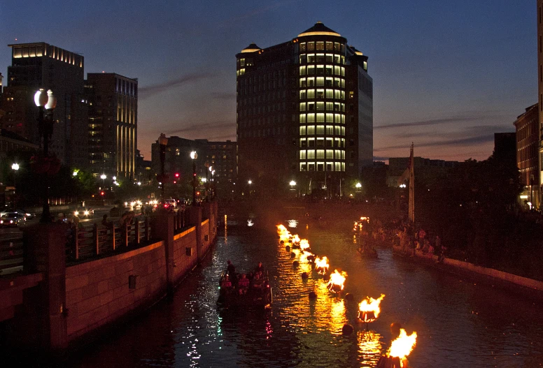 city lights reflected in the water at dusk