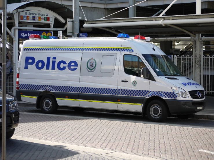 a police truck parked on the side of a street