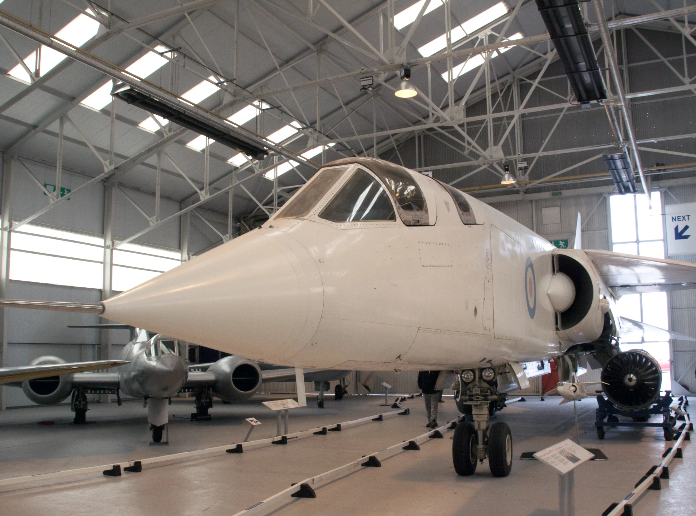 a large air plane sitting in a hanger