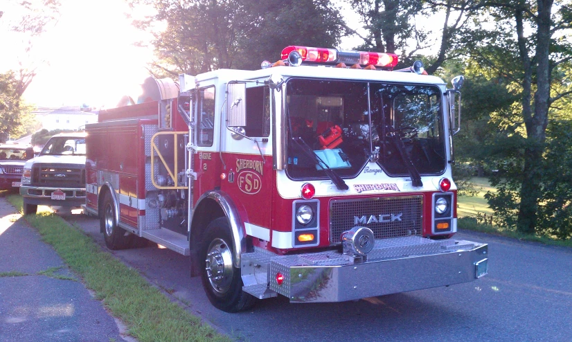 a couple of fire engines that are parked in the street