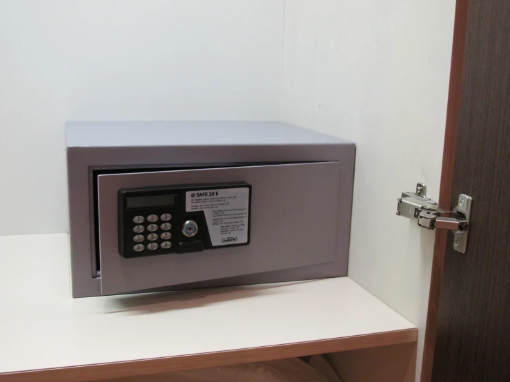 a metal and metal safe with an electronic keypad