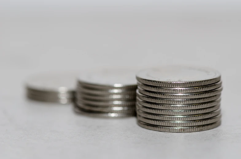 a pile of coin sitting on top of a table